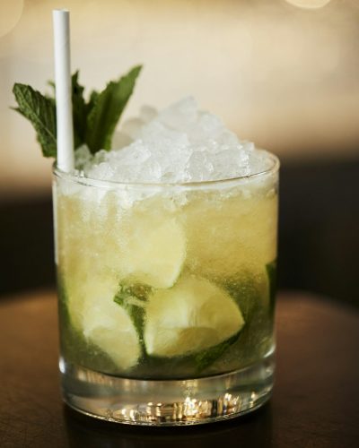 Close Up Of Mojito Cocktail On Bar Counter